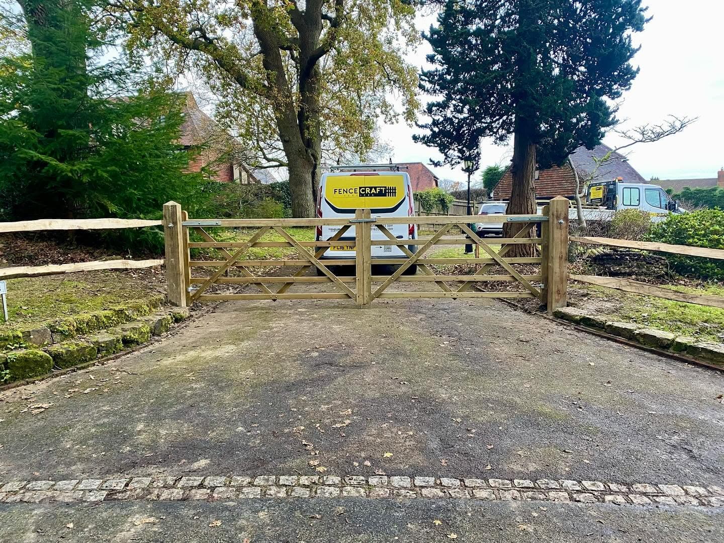 Fencecraft van parked behind a new five-bar timber gate on a Kent driveway Fencecraft van parked behind a new five-bar timber gate on a Kent driveway